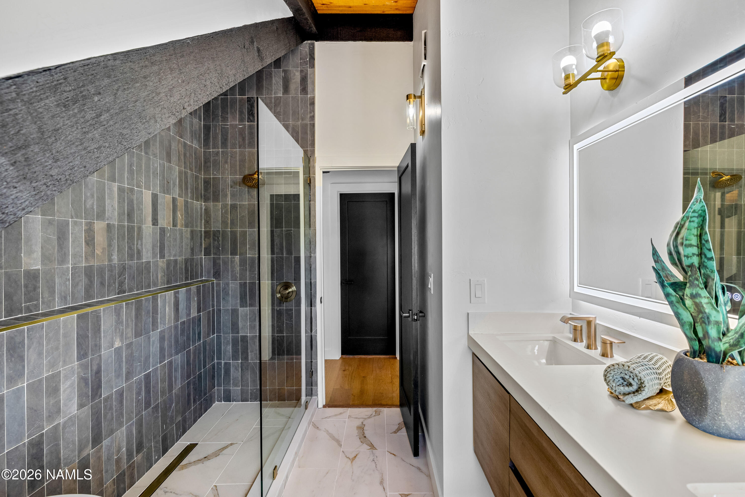 8191 June Lane Flagstaff, AZ 86004 - Photo 36 of 45 a bathroom with a tub and sink