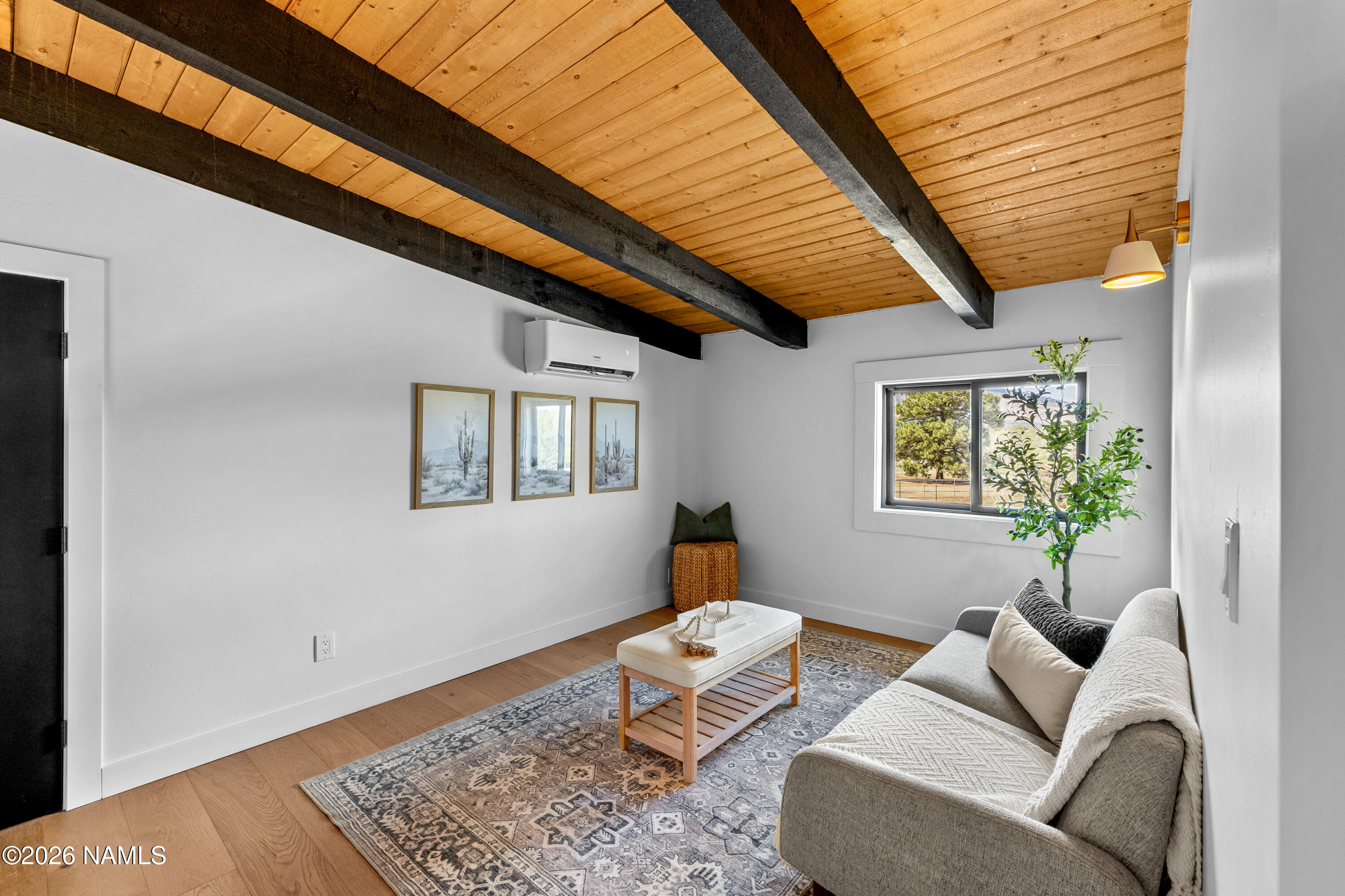 8191 June Lane Flagstaff, AZ 86004 - Photo 37 of 45 a living room with furniture and a window