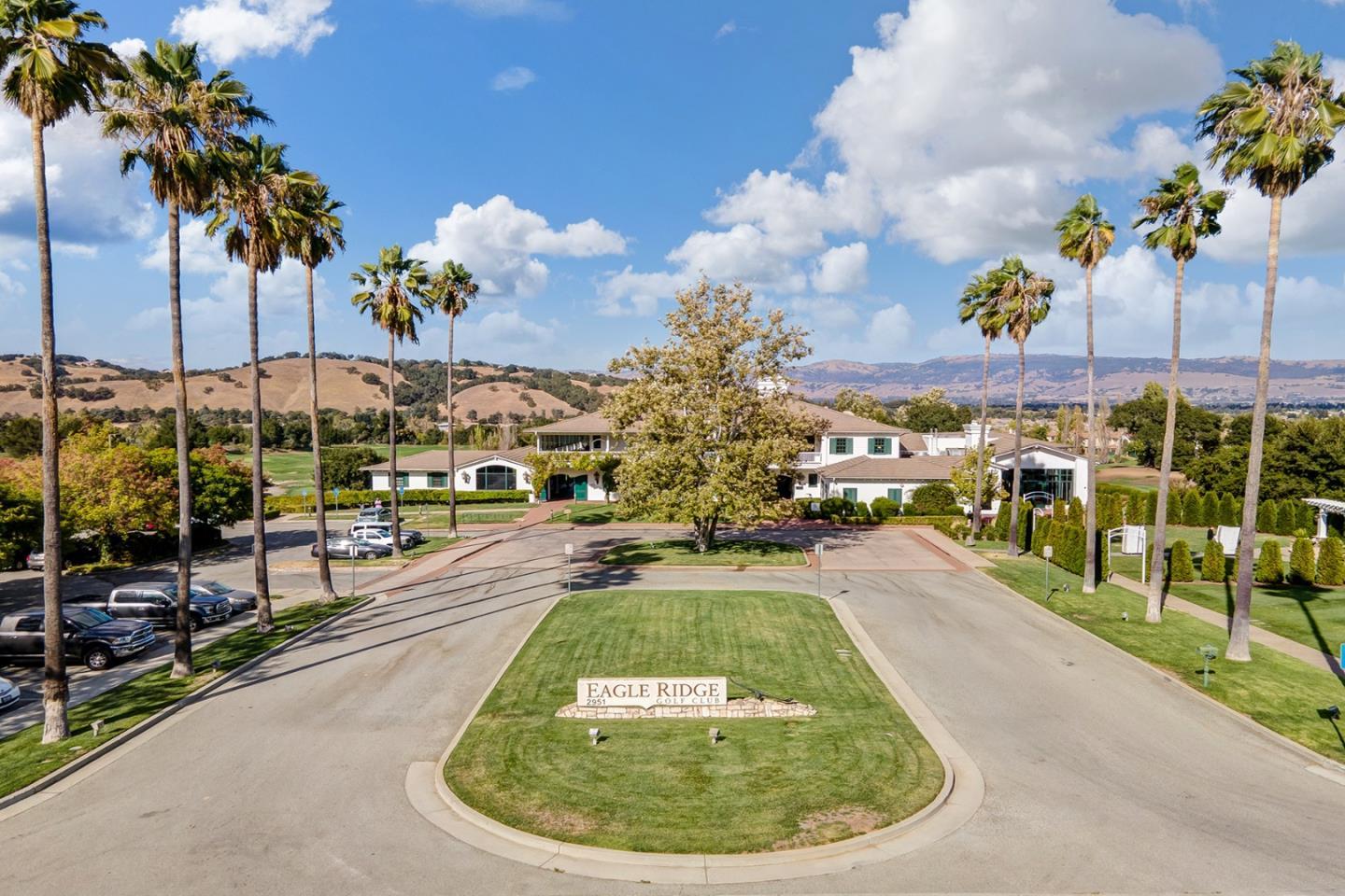 7265 Eagle Ridge Drive Gilroy, CA 95020 - Photo 7 of 34 a view of a swimming pool with a bench and lawn chairs