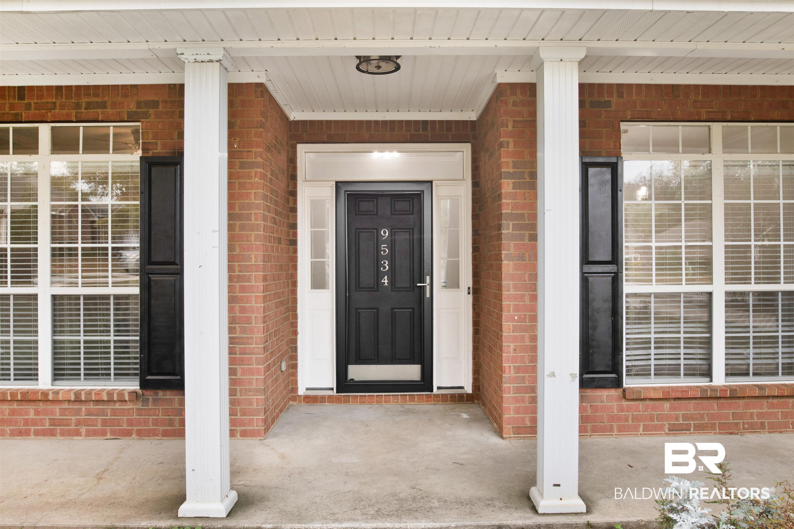 9534 Labrador Run North Mobile, AL 36695 - Photo 4 of 30 Entrance to property with brick siding and covered porch