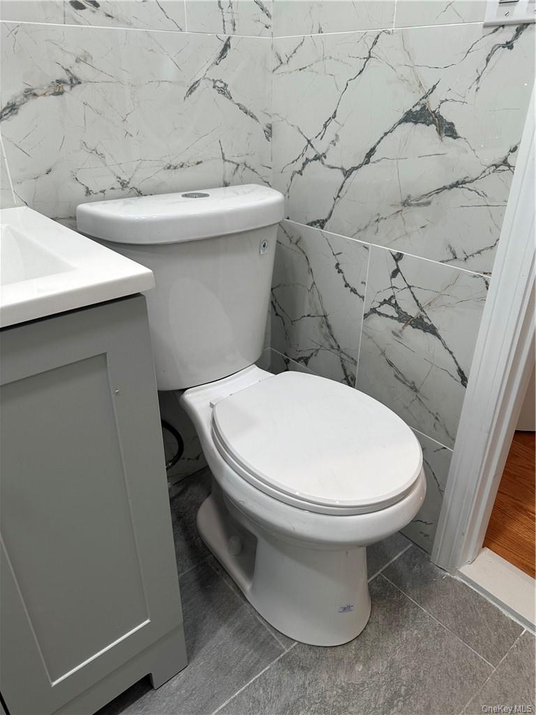 145-149 Morningside Avenue, Unit 2C Manhattan, NY 10027 - Photo 7 of 12 a white toilet sitting next to a white sink