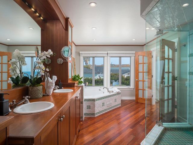 a bath tub sitting in front of a window