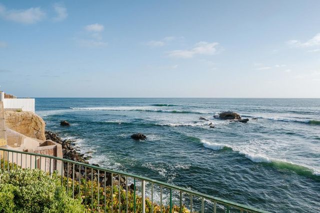 a car parked in front of a house