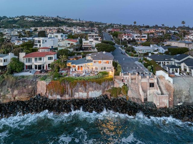 an aerial view of residential house with outdoor space