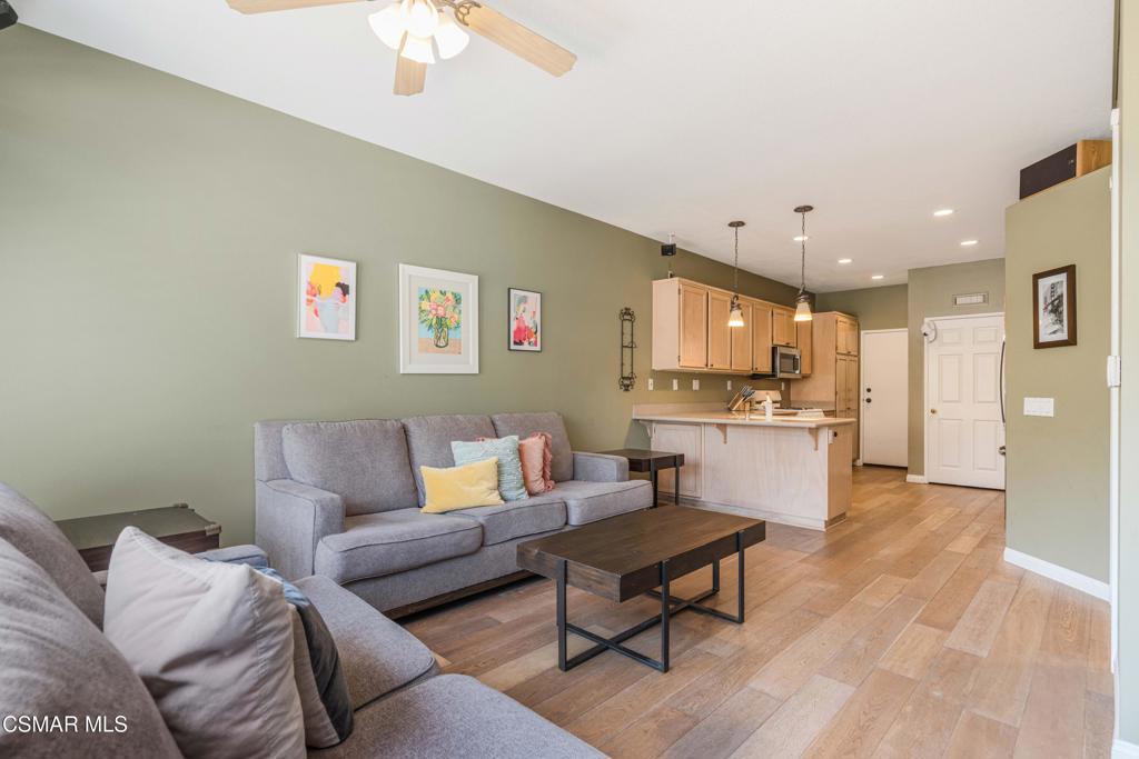 11529 Treeview Court Moorpark, CA 93021 - Photo 11 of 23 a living room with furniture and kitchen view