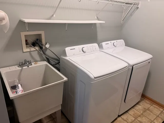 a utility room with dryer and washer