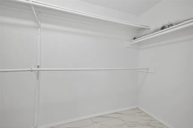 a view of a room with racks on the wall