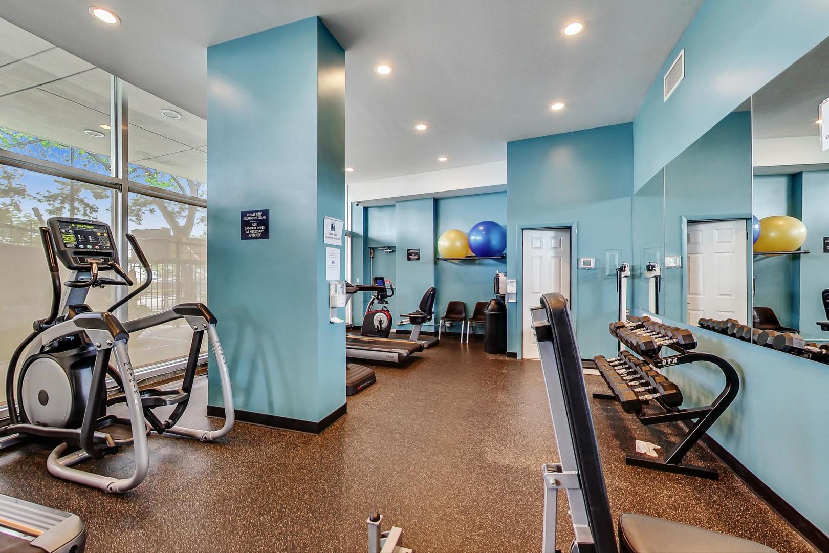 1150 North Lake Shore Drive, Unit 11J Chicago, IL 60611 - Photo 25 of 34 a view of a room with gym equipment