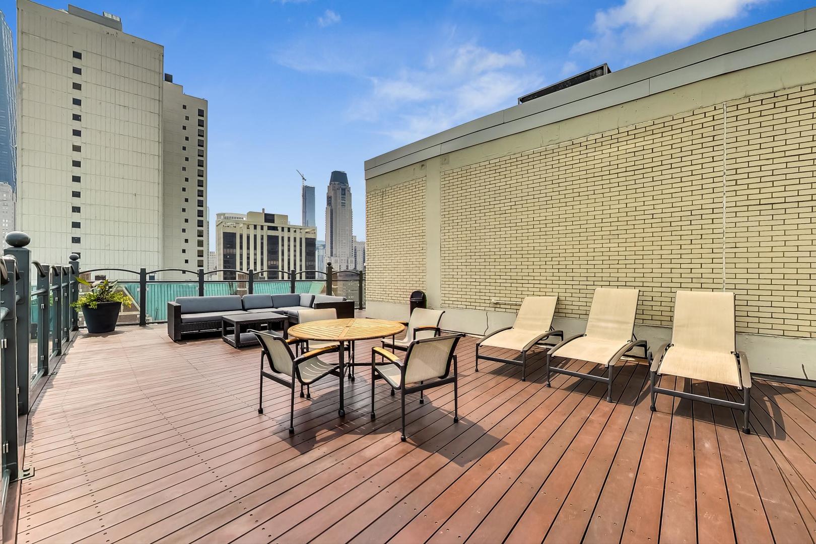 1150 North Lake Shore Drive, Unit 11J Chicago, IL 60611 - Photo 31 of 34 a view of a terrace with seating area