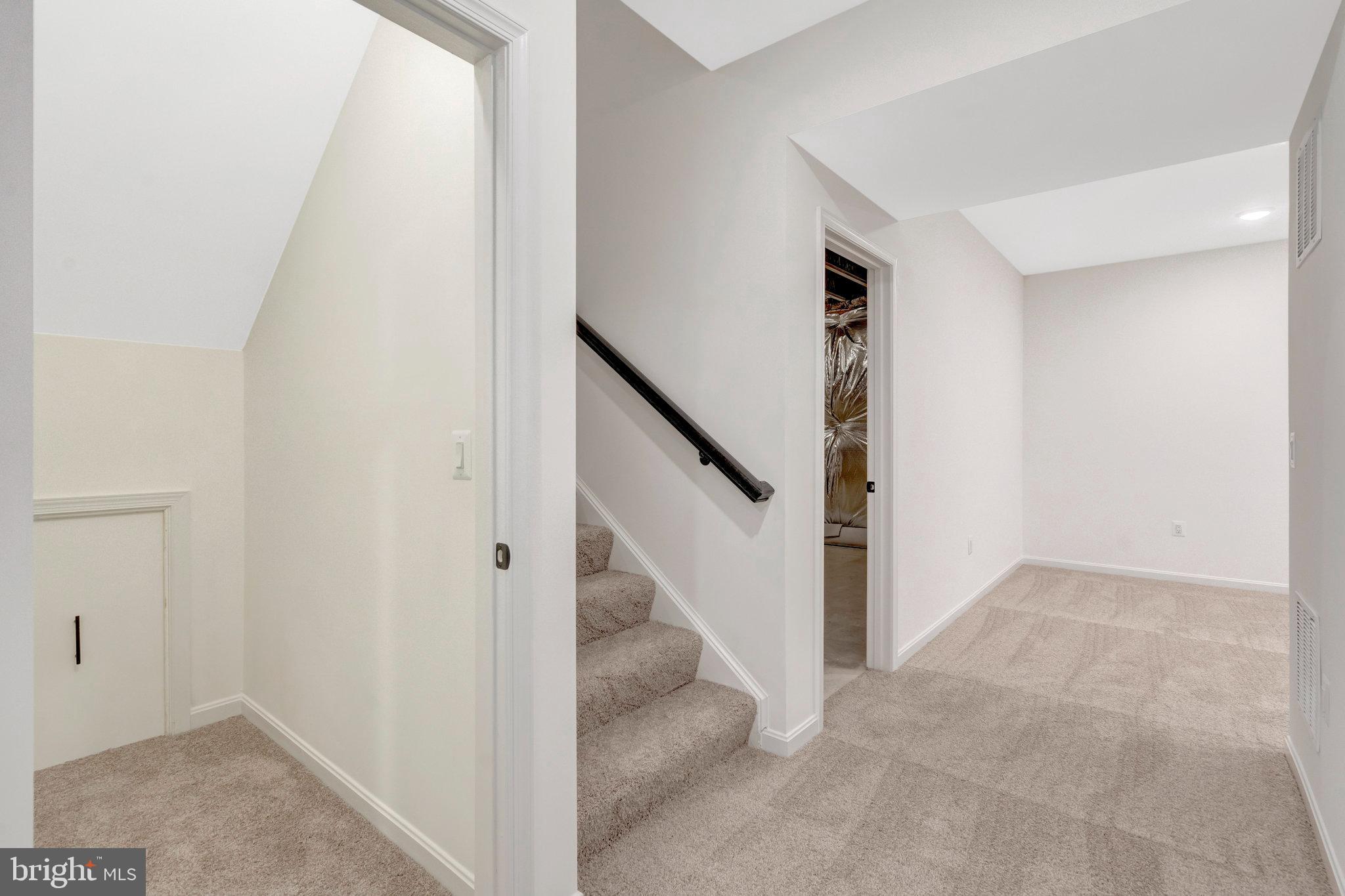 1925 Sunset Lane Culpeper, VA 22701 - Photo 57 of 74 a view of a hallway with staircase
