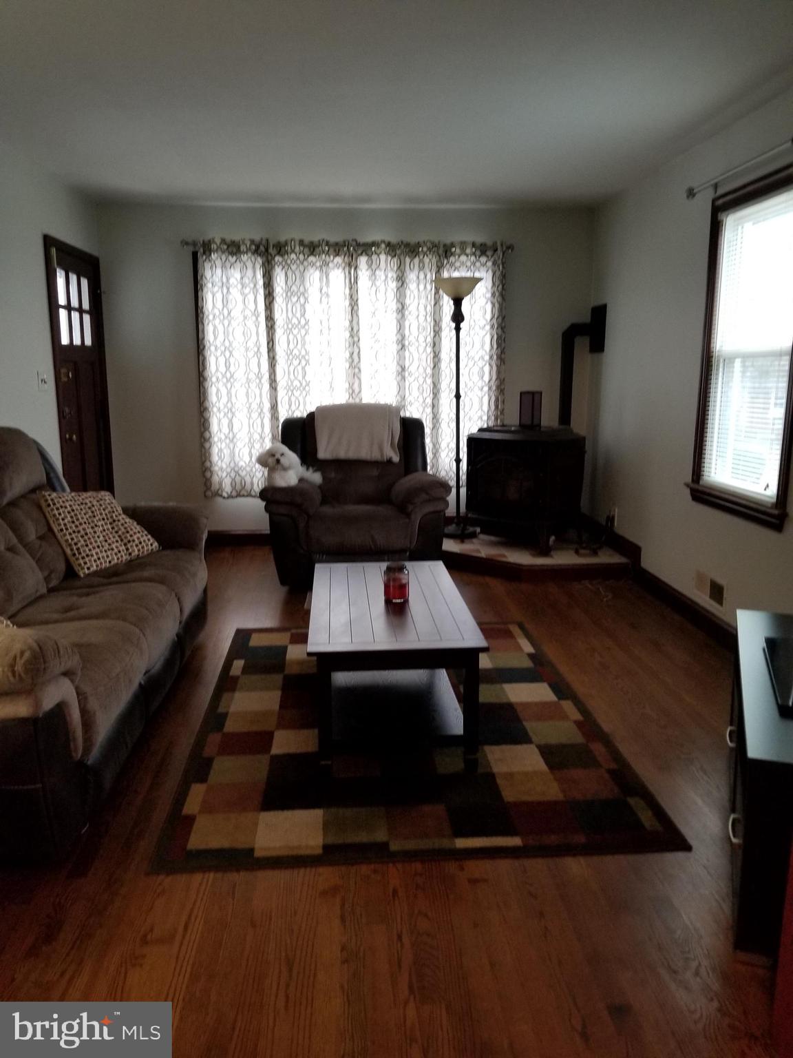 301 Charles Road Linthicum, MD 21090 - Photo 7 of 20 Living room with pellet stove