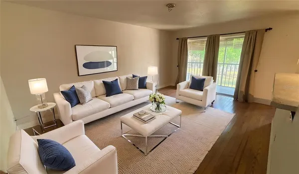 a kitchen with a refrigerator and a sink