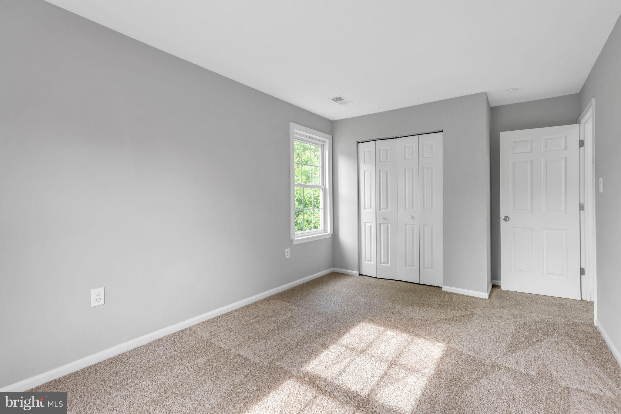 7400 Jaffrey Road Fort Washington, MD 20744 - Photo 11 of 31 a view of an empty room with a window