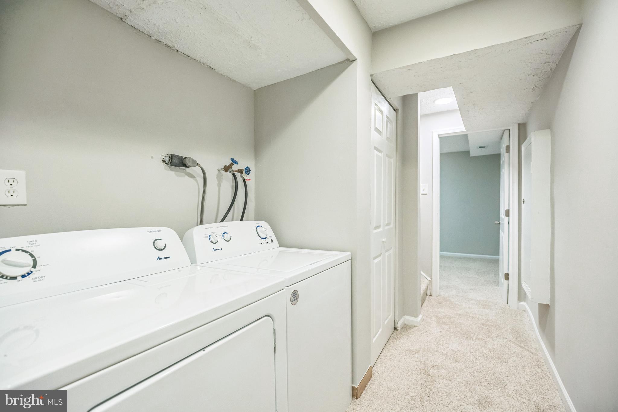 7400 Jaffrey Road Fort Washington, MD 20744 - Photo 25 of 31 a view of washer and dryer with bathroom in the background
