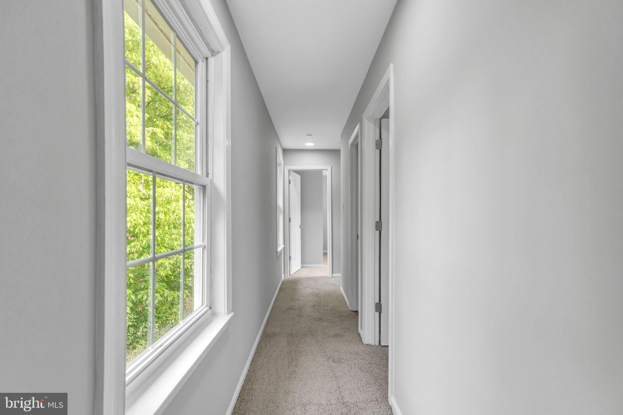 7400 Jaffrey Road Fort Washington, MD 20744 - Photo 28 of 31 a view of a hallway with windows