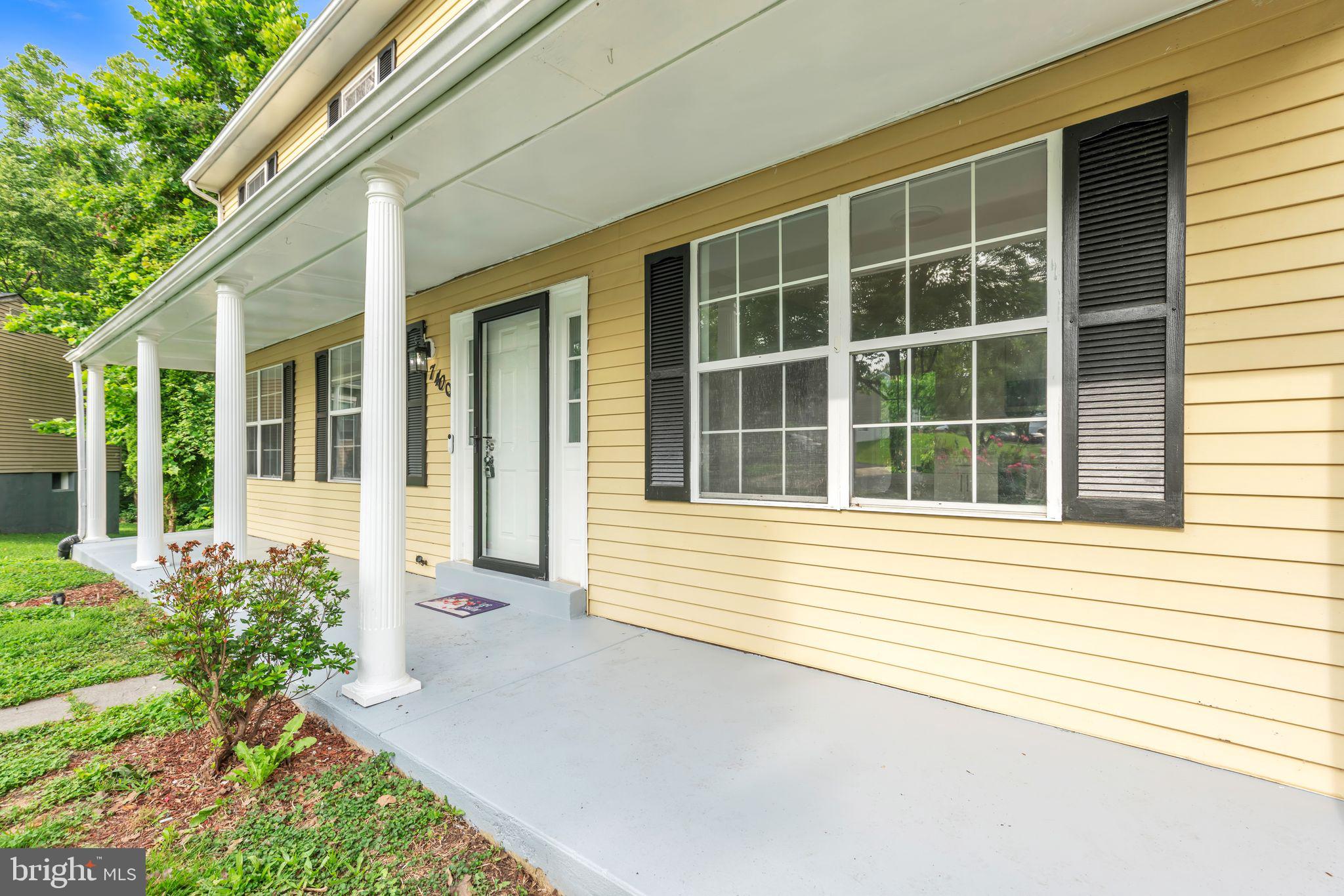 7400 Jaffrey Road Fort Washington, MD 20744 - Photo 4 of 31 a view of a house with a large window