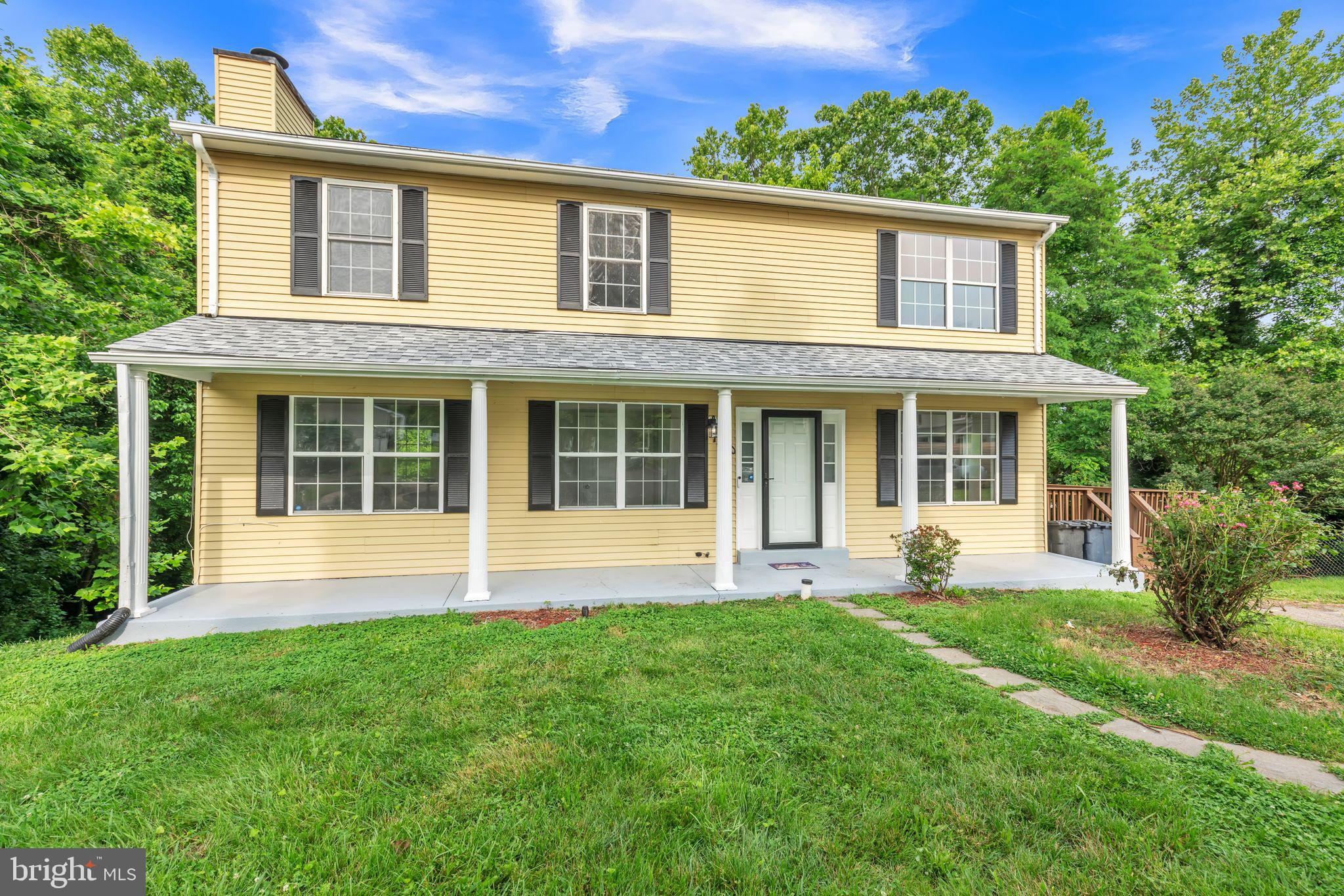 7400 Jaffrey Road Fort Washington, MD 20744 - Photo 6 of 31 front view of a house that has a yard