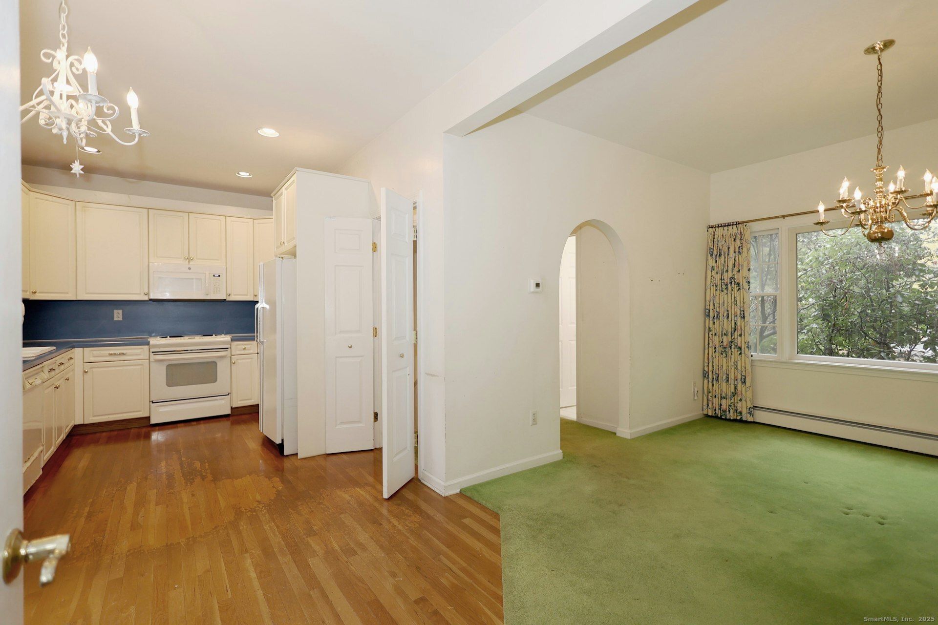 1213 Cedar Road Fairfield, CT 06890 - Photo 12 of 40 a view of a kitchen with a sink and cabinets