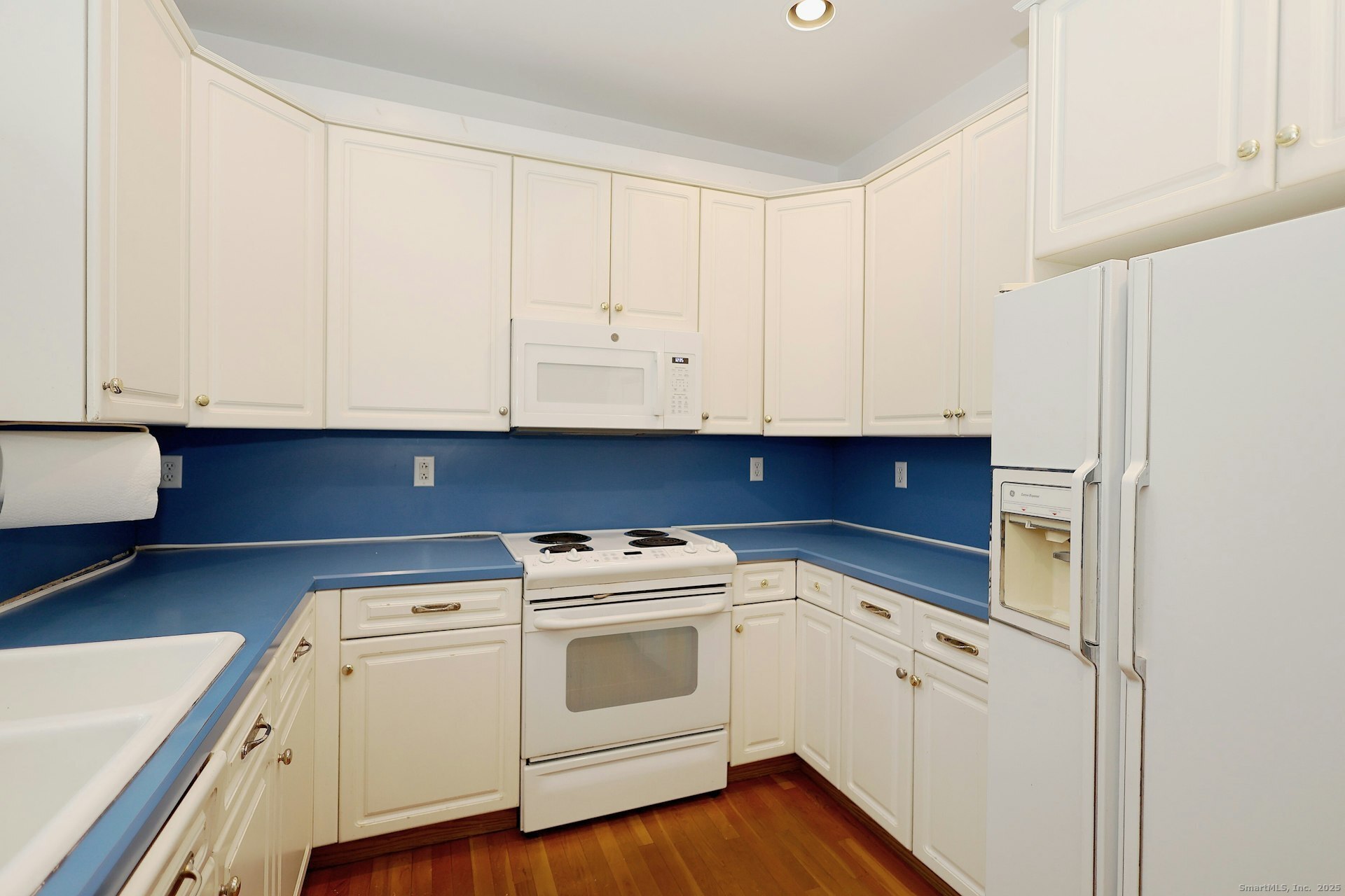 1213 Cedar Road Fairfield, CT 06890 - Photo 15 of 40 a view of a storage and utility room with washer and dryer