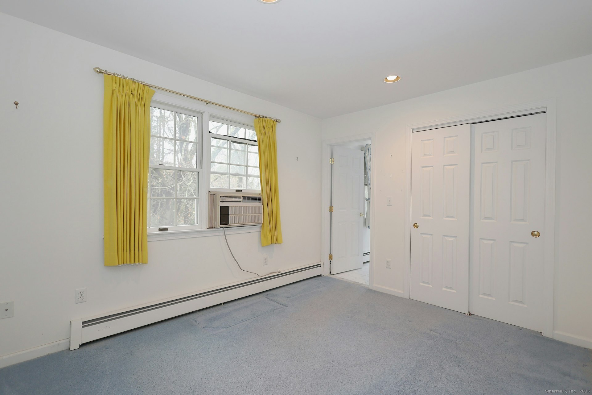 1213 Cedar Road Fairfield, CT 06890 - Photo 27 of 40 a view of an empty room with a window