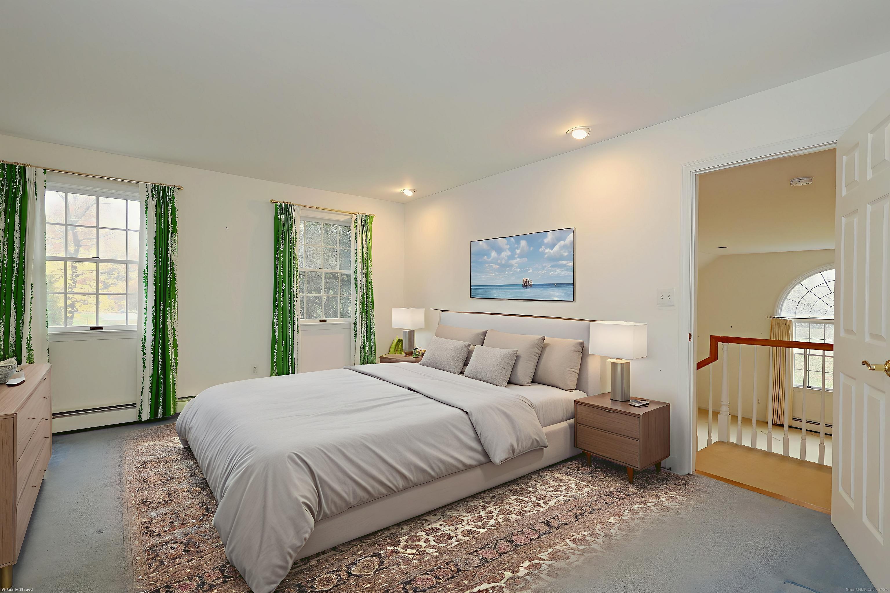 1213 Cedar Road Fairfield, CT 06890 - Photo 29 of 40 a spacious bedroom with a large bed and a window