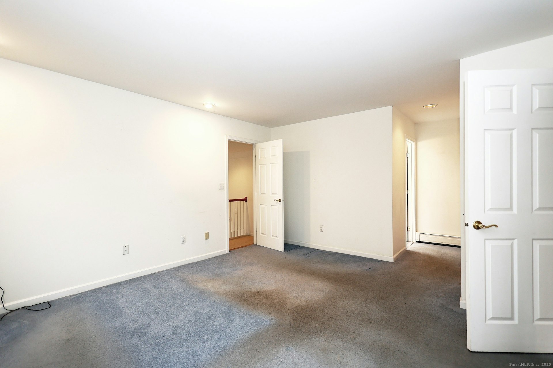 1213 Cedar Road Fairfield, CT 06890 - Photo 30 of 40 an empty room with windows