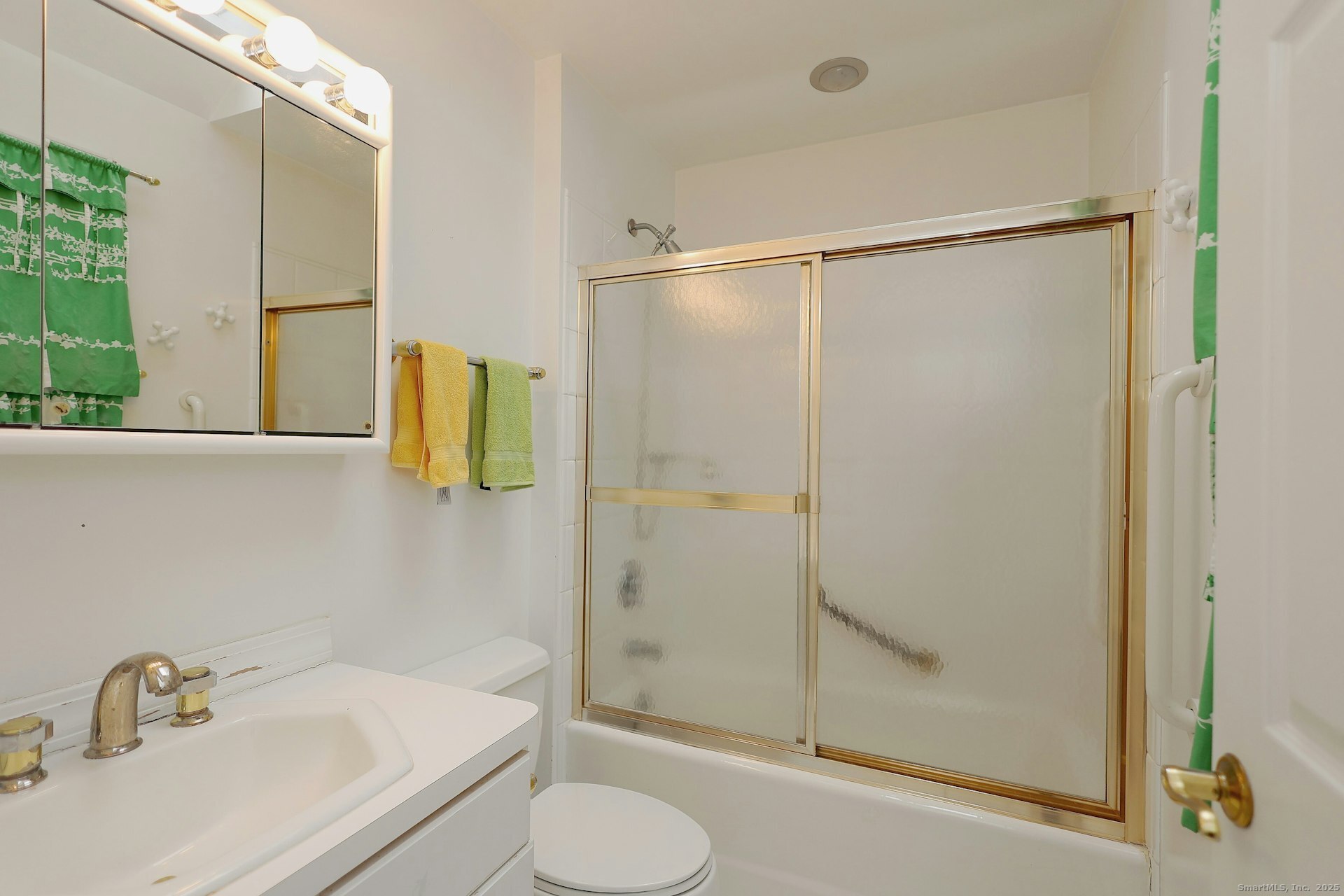 1213 Cedar Road Fairfield, CT 06890 - Photo 32 of 40 a bathroom with a sink and a shower