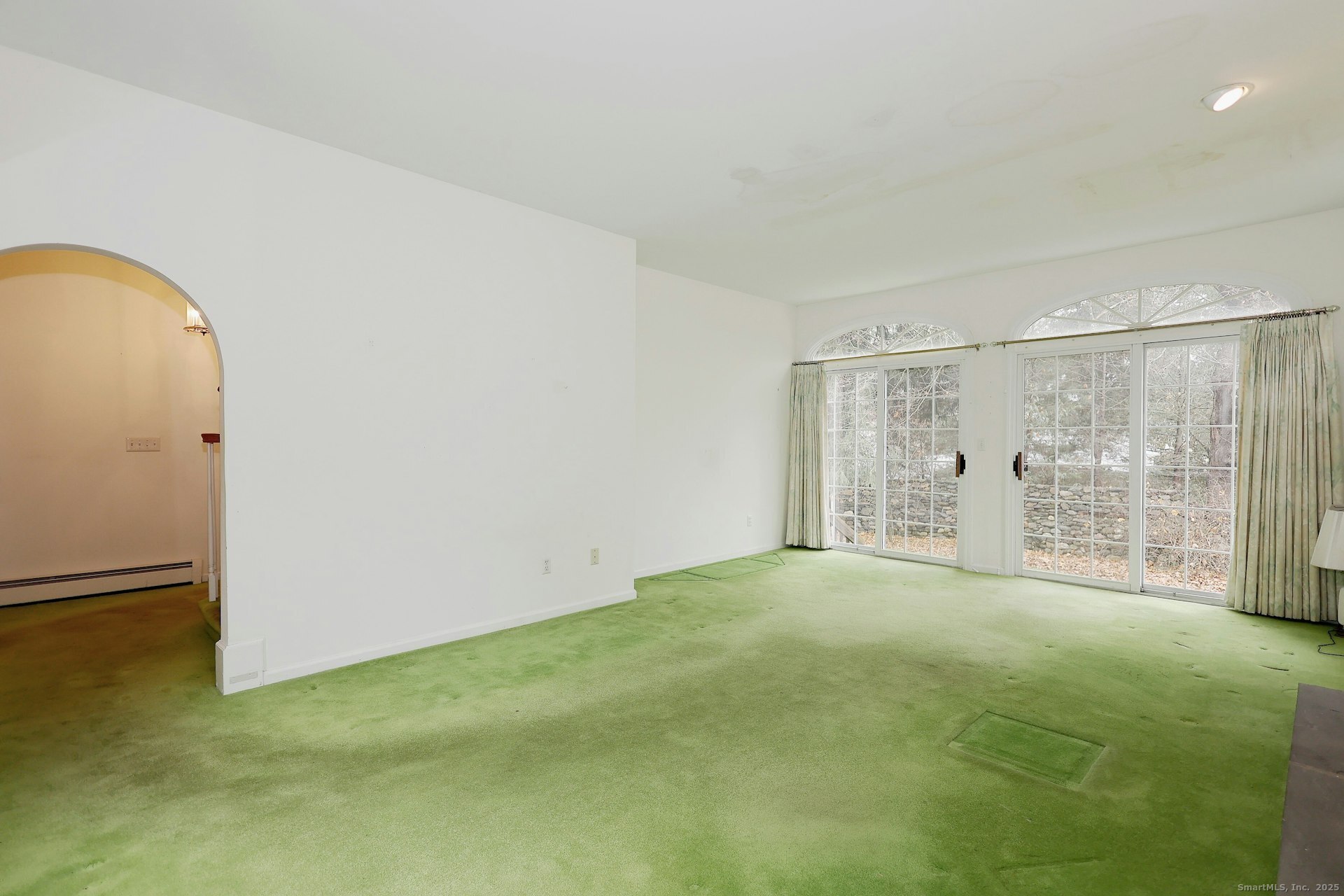 1213 Cedar Road Fairfield, CT 06890 - Photo 9 of 40 an empty room with windows