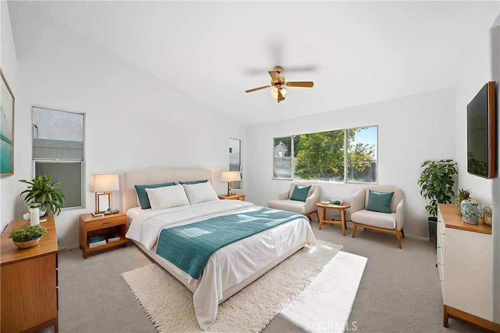 4875 Lake Shore Place Fallbrook, CA 92028 - Photo 14 of 31 a bedroom with a large bed and a window