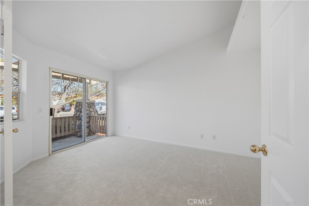 4875 Lake Shore Place Fallbrook, CA 92028 - Photo 16 of 31 a view of an empty room with a window