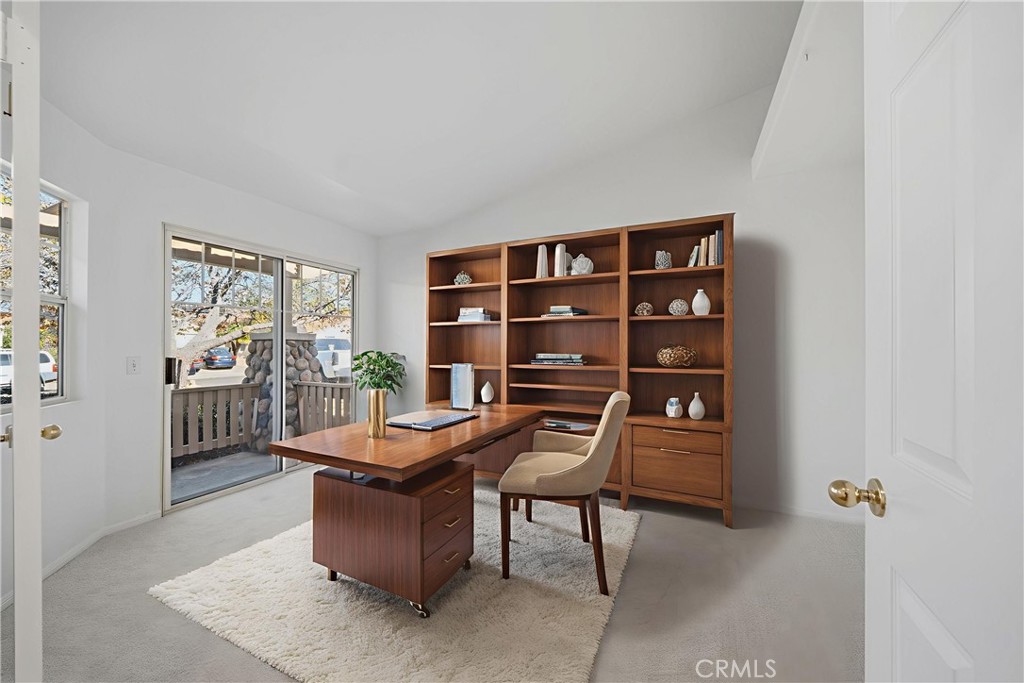 4875 Lake Shore Place Fallbrook, CA 92028 - Photo 17 of 31 a living room with furniture and a book shelf