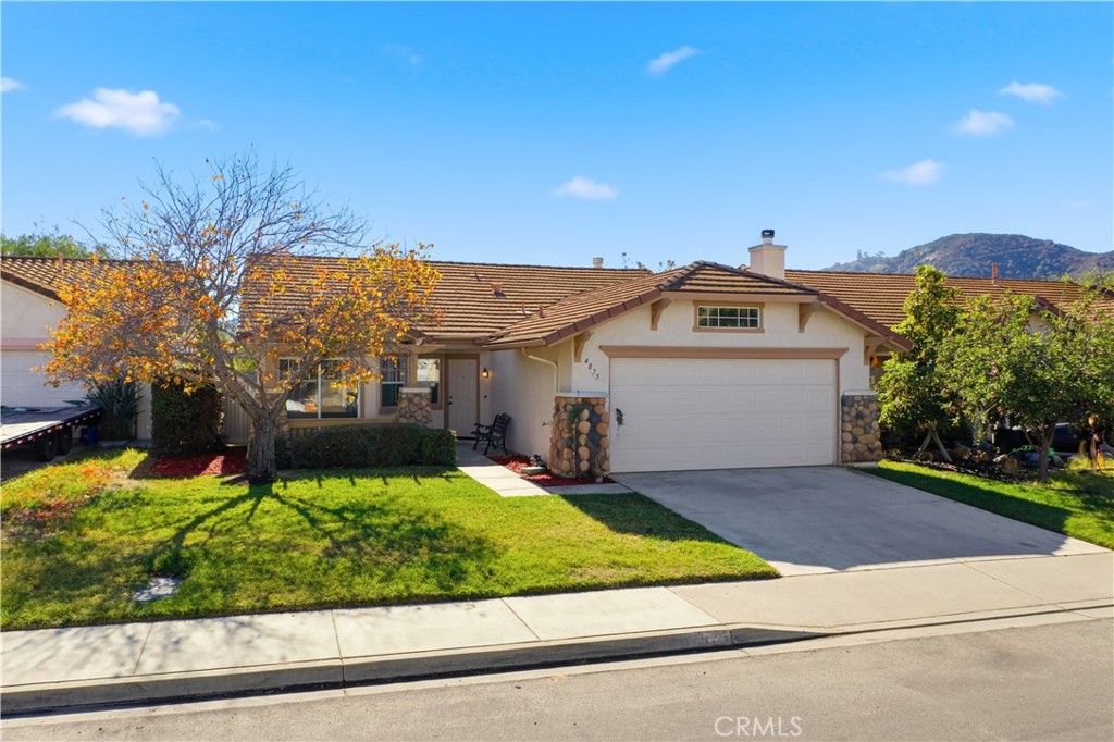 4875 Lake Shore Place Fallbrook, CA 92028 - Photo 2 of 31 a view of a house with a yard and potted plants
