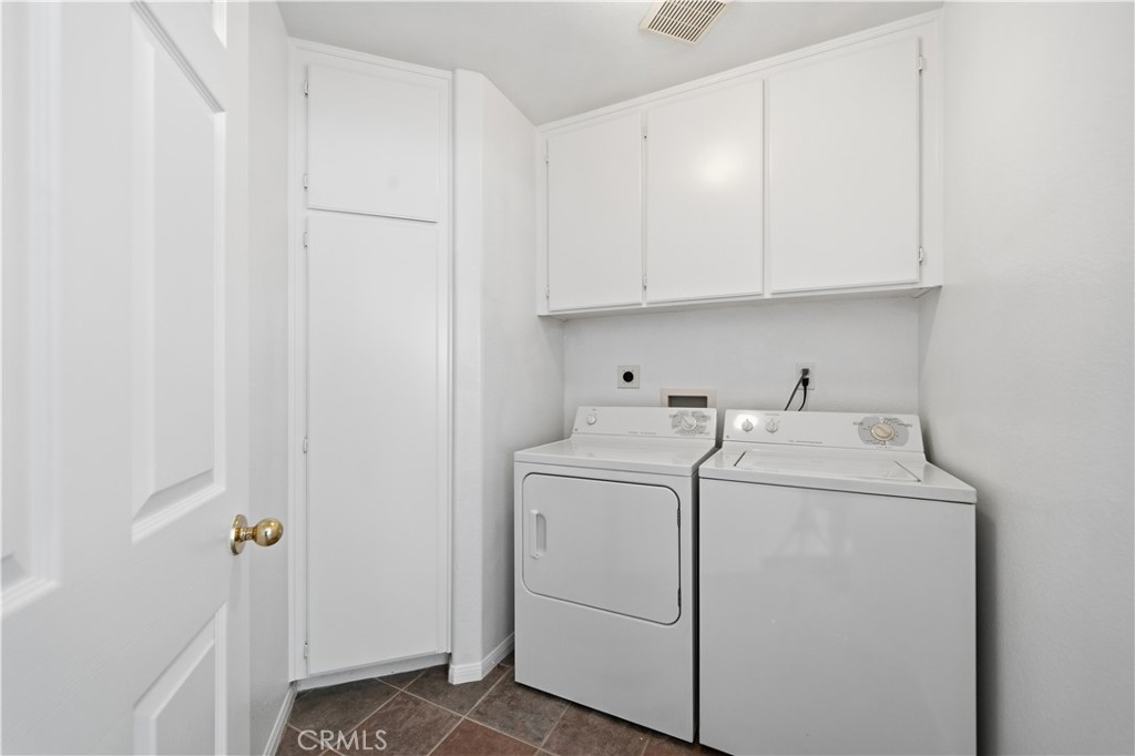 4875 Lake Shore Place Fallbrook, CA 92028 - Photo 22 of 31 a utility room with dryer and washer