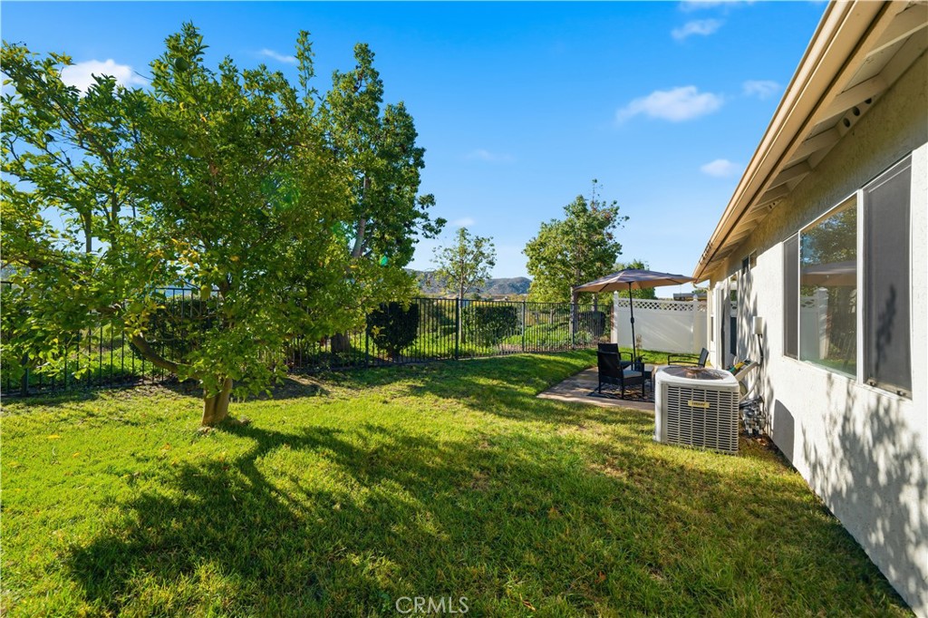 4875 Lake Shore Place Fallbrook, CA 92028 - Photo 23 of 31 a view of a house with backyard