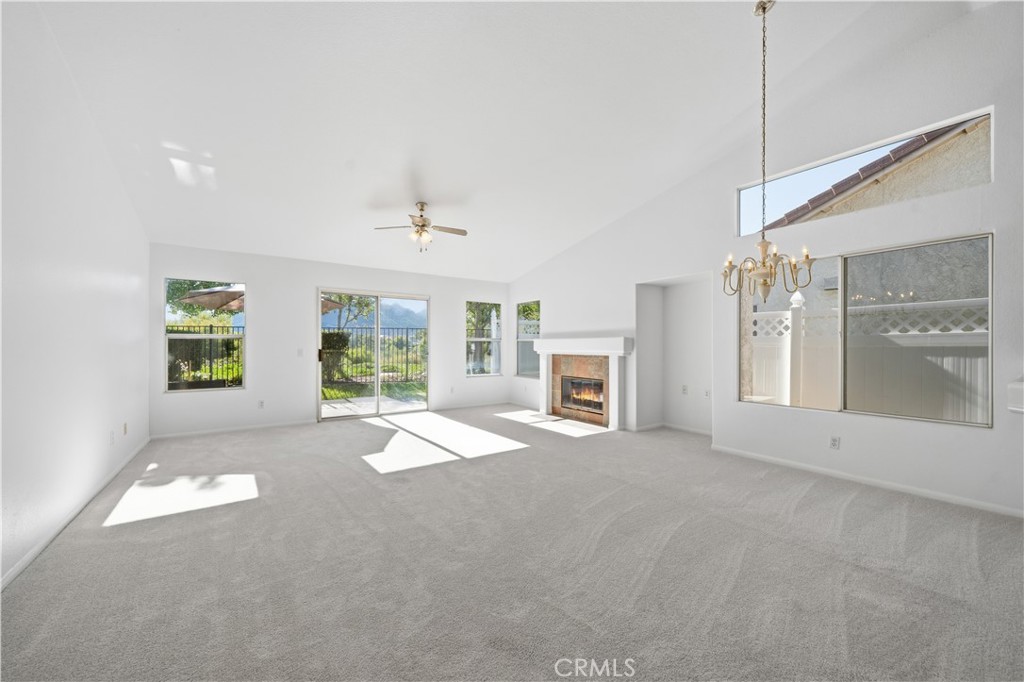 4875 Lake Shore Place Fallbrook, CA 92028 - Photo 4 of 31 a view of a livingroom with a fireplace