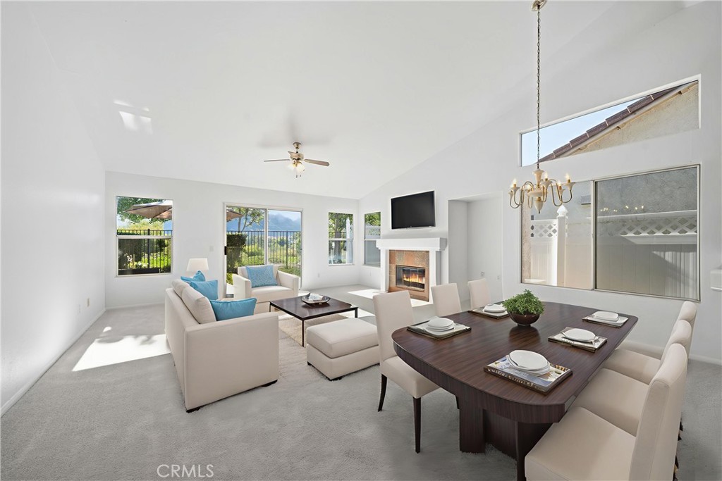 4875 Lake Shore Place Fallbrook, CA 92028 - Photo 5 of 31 a living room with furniture and a fireplace