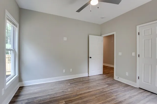 a bathroom with a sink a toilet and a tub