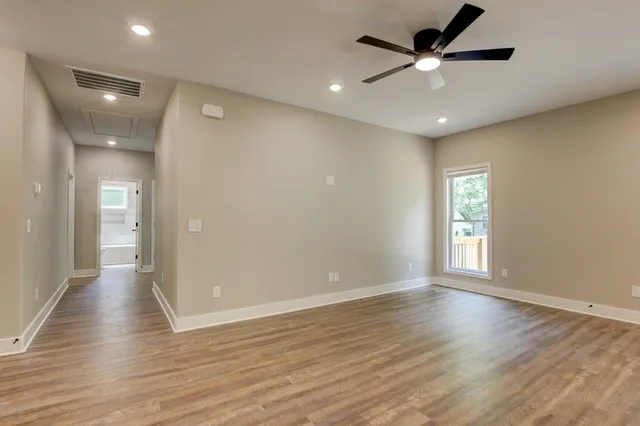 a view of entryway and hall with a window