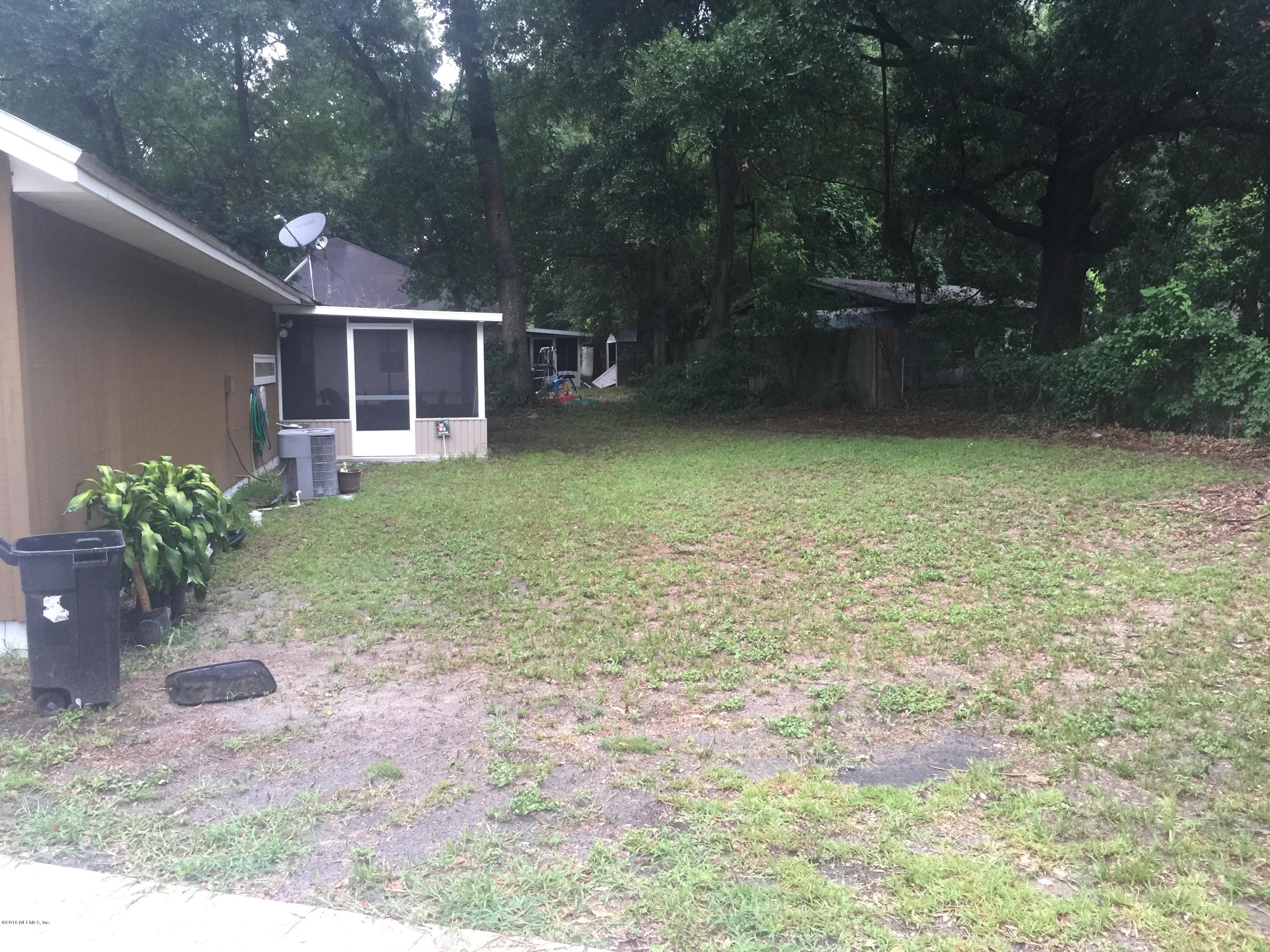 9315 Ribault Avenue Jacksonville, FL 32208 - Photo 3 of 12 IMG_1239