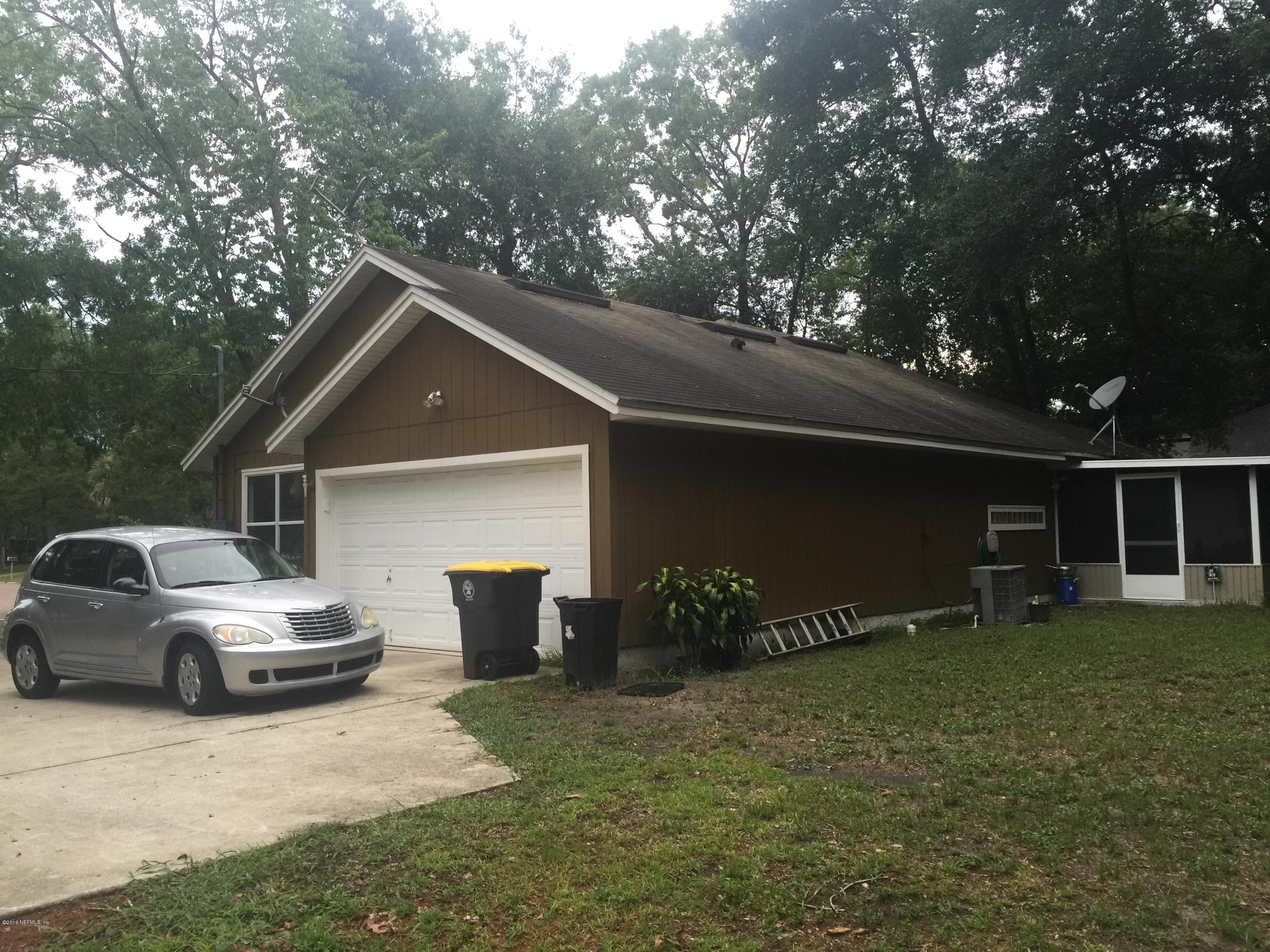 9315 Ribault Avenue Jacksonville, FL 32208 - Photo 4 of 12 IMG_1240