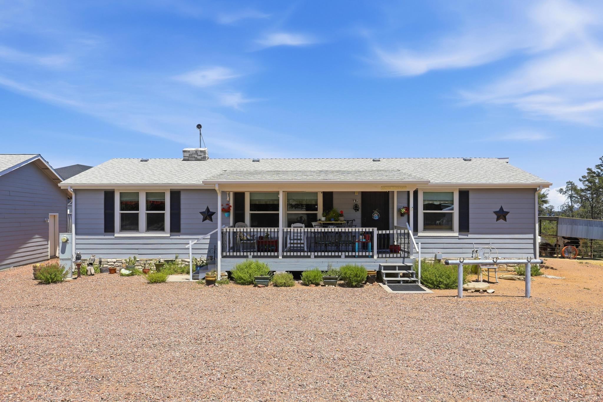 1211 Heather Circle Payson, AZ 85541 - Photo 28 of 51 front view of a house with a yard