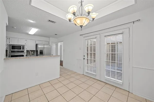 a view of kitchen and windows