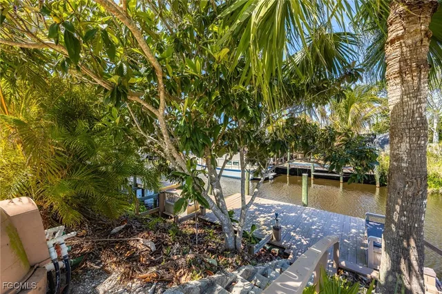 a view of a lake with a sitting area