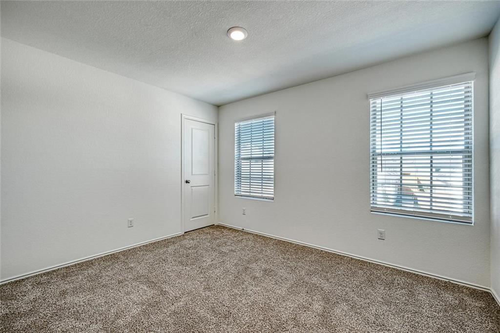 772 Circle Way Jarrell, TX 76537 - Photo 19 of 20 an empty room with a window
