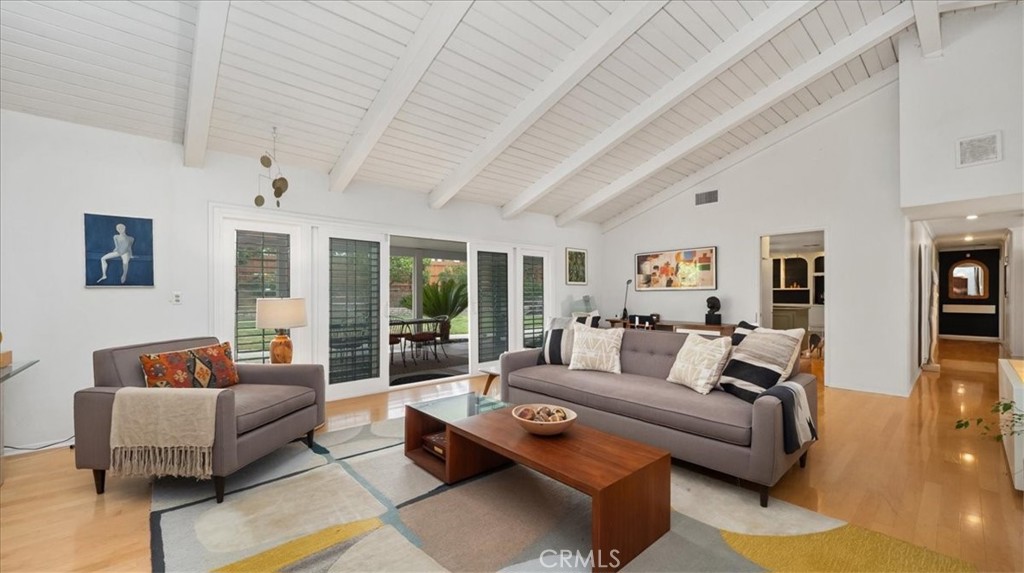 2318 Elsinore Road Riverside, CA 92506 - Photo 11 of 41 a living room with furniture and a large window