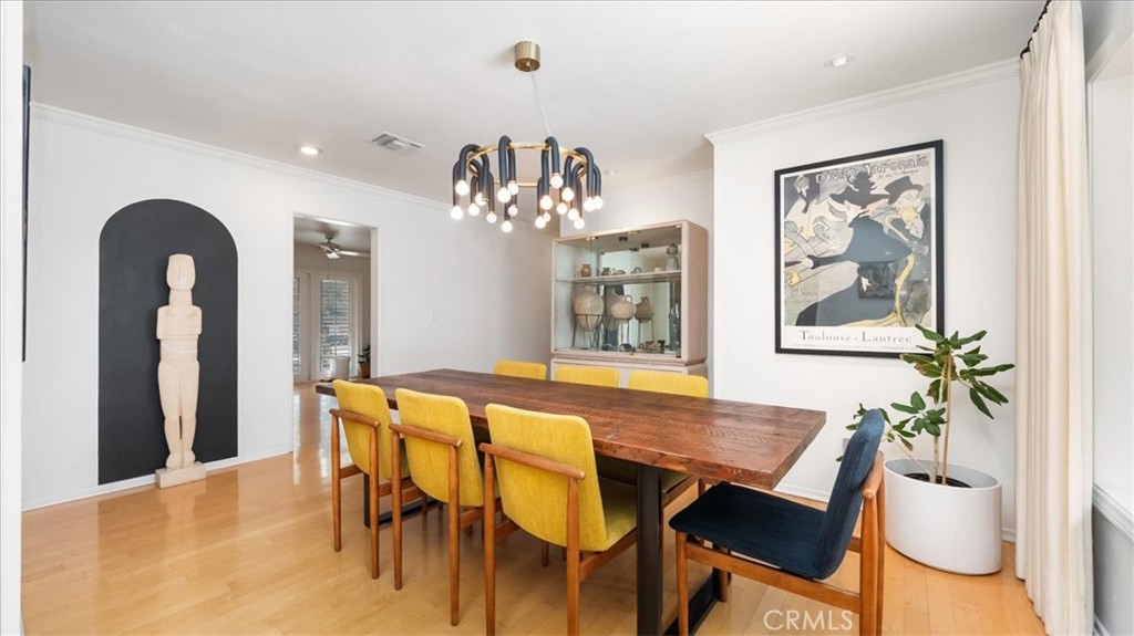 2318 Elsinore Road Riverside, CA 92506 - Photo 6 of 41 a view of a dining room with furniture and chandelier