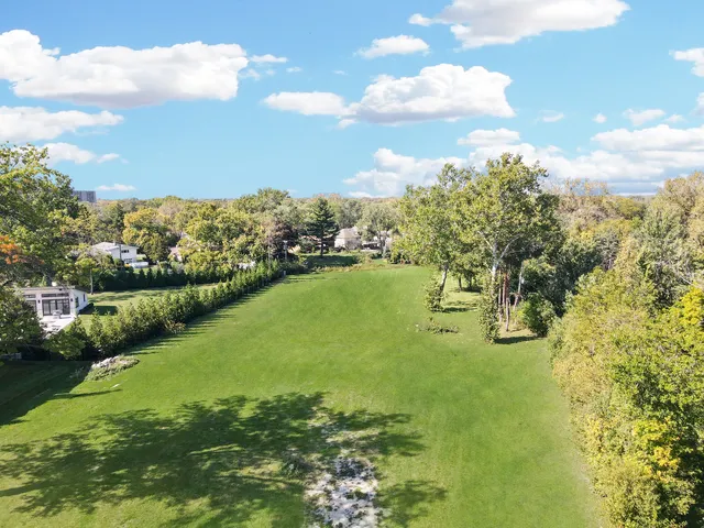 a view of a lake with a city