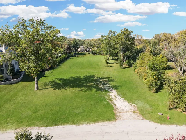 a view of a lake with a big yard
