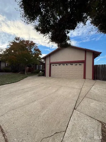 front view of a house with a garage