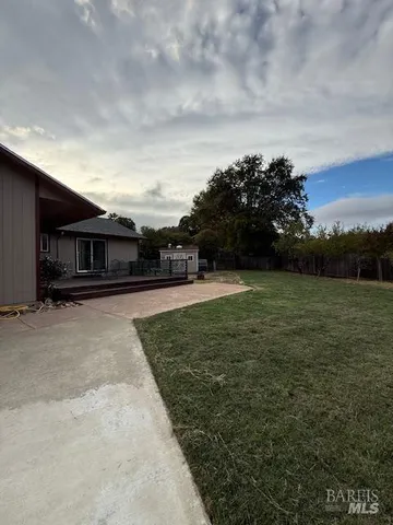 a view of house with outdoor space